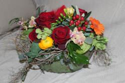 Blumengesteck rot gelb orange (ausgeliefert am 16. Januar 2016 in Grosshöchstetten)