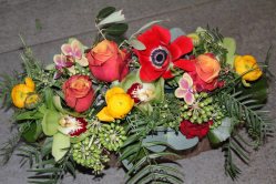 Blumengesteck orange rot (ausgeliefert in konolfingen am 15. Januar 2015)