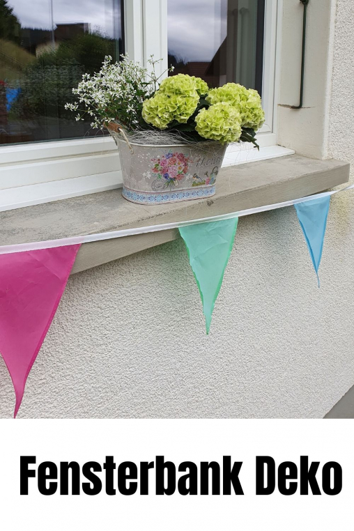 Fensterbank-Deko-Sommerdekoration-in-weiss-Aussen.jpg